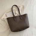 Minimalist deep brown tote bag in matte leather with long handles for office commute - Brown