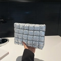Chic silver quilted cosmetic clutch with metallic finish and puffy square texture - Silver