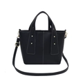 Minimalist black bucket handbag in lychee leather with white contrast stitching and gold hardware - Black