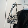 Sac hobo chic en fausse fourrure à imprimé léopard avec un motif animalier - Noir