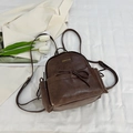 Mini mochila retro de cuero marrón con detalle de lazo y correas ajustables - Marrón