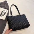 Classic black quilted tote bag with golden metal hardware for large capacity commuting - Black