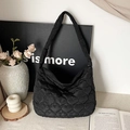 Large black quilted hobo bag with unique heart pattern stitching for women - Black