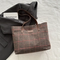 Brown houndstooth canvas tote bag with leather handles and minimalist rectangular patch - Brown