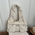 Borsa tote in velluto a coste crema con stampe a cuori e un grande fiocco decorativo - Bianco
