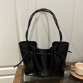 Glossy black patent leather tote bag with elegant drawstring side details for women - Black