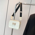 Sweet cream crossbody square bag with gold bow decoration and wide woven strap - White