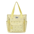 Yellow tote bag with black star pattern featuring front zipper pocket and side pouches - Yellow