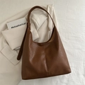 Bolso tote marrón de cuero sintético texturizado con costuras verticales y asa ancha - Marrón