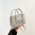 Chic light gray mini crossbody bag with golden hardware and long tassel decoration - Silver