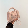 Pink crossbody handbag with marble pattern and golden hardware tassel detail - Pink