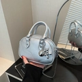Silver metallic mini round handbag with lychee texture and cute balloon dog charm - Silver