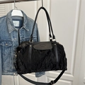 Large black pleated travel bag with smooth leather handles and wide shoulder strap - Black