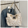 Borsa tote in tela beige a fiori con tasche multiple e tracolla regolabile - Cachi