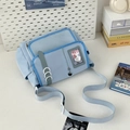 Light blue canvas ita bag messenger style with clear window and mesh pocket for pins - Blue