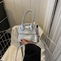 Mini silver crossbody handbag featuring embossed crocodile pattern and a metallic finish - Silver