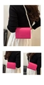 Detail view of pink leather shoulder bag with large faux pearl strap and brand print - Rose Red