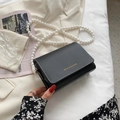 Elegant black PU leather flap crossbody bag with pearl strap and white stitching - Black