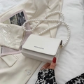 Elegant white PU leather square handbag with long pearl strap and black logo detail - White