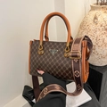 Borsa tote vintage con motivo monogramma scuro e dettagli in pelle arancione - Marrone