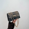 Stylish crossbody bag featuring gray leopard print with a golden bead chain strap - Black