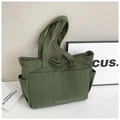 Large dark grass green corduroy tote bag with multiple exterior pockets for commuting - Green
