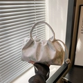 Bolso de mano beige con estampado de mariposas, diseño plisado y cierre de cordón - Verde