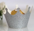 Macro view of silver glitter crown cupcake wrappers for chocolate or dessert decor - Silver Glitter