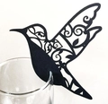 Detail of laser-cut black hummingbird place card with floral hollow pattern on glass - Black Khaki