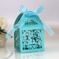 Macro detail of laser-cut birdcage candy box with delicate organza ribbon bow - Tiffany Blue