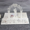 Exquisite 3D laser-cut wedding invitation featuring a romantic ivory couple arch design - Ivory