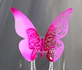 Detail of rose pink laser-cut butterfly cup card with rose patterns on a glass rim - Reflective Rose Red