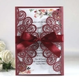 Laser cut burgundy wedding invitation card with elegant floral patterns and satin ribbon bow - Dark Red