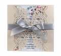 Champagne laser cut wedding invitation with white floral insert and silver satin bow - Nude Pink
