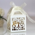White laser-cut love bird candy gift box with elegant cream ribbon and golden chocolate - Ivory White