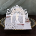 Elegant white laser-cut 3D wedding invitation with floral arch and couple silhouette - White