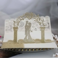 Golden glitter 3D pop-up wedding invitation featuring a romantic silhouette in a heart arch - Light Gold Color