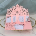 Pink laser-cut wedding invitation featuring a 3D silhouette arch and floral inner card - Pink