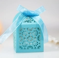 Laser-cut blue candy gift box with elegant floral hollow pattern and satin ribbon bow - Tiffany Blue