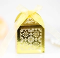 Golden laser-cut wedding favor box with floral patterns and a soft yellow ribbon bow - Reflective Gold
