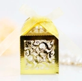 Elegant gold laser-cut candy box with yellow organza ribbon for weddings and parties - Reflective Gold