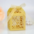 Laser-cut yellow hollow candy box with floral lace pattern and organza ribbon bow - Gold