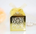Golden laser-cut hollow candy box with heart patterns and an elegant organza ribbon - Reflective Gold