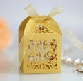 Elegant gold laser-cut European candy gift box with floral patterns and a ribbon bow - Gold