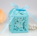 Sky blue laser-cut wedding favor box with matching organza ribbon and elegant vine patterns - Turquoise Blue