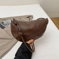 Minimalist dark brown crescent shoulder bag with knot detail and silver zipper - Brown