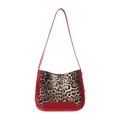 Fashionable leopard print handbag with bold red leather accents and shoulder strap - Red