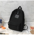 Zaino minimalista in tela nera stile coreano con toppa logo in pelle e tasche capienti - Nero