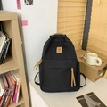 Sac à dos en toile noire minimaliste avec détails en cuir et écusson logo carré - Noir