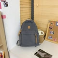 Sac à dos en nylon gris foncé pour filles avec design incurvé et détails marrons - gris foncé